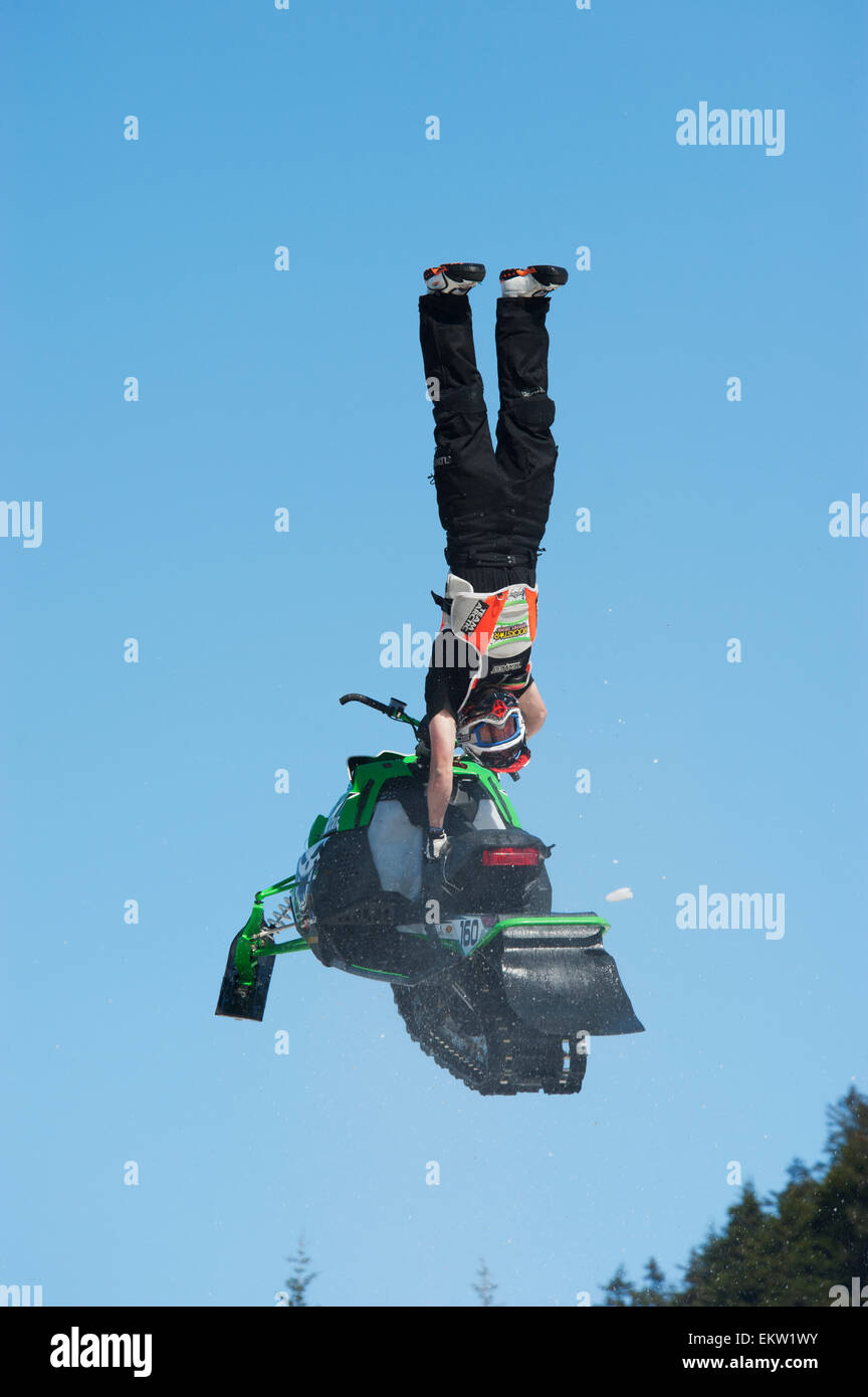 Snow machine riders perform deathdefying aerial maneuvers at Alyeska