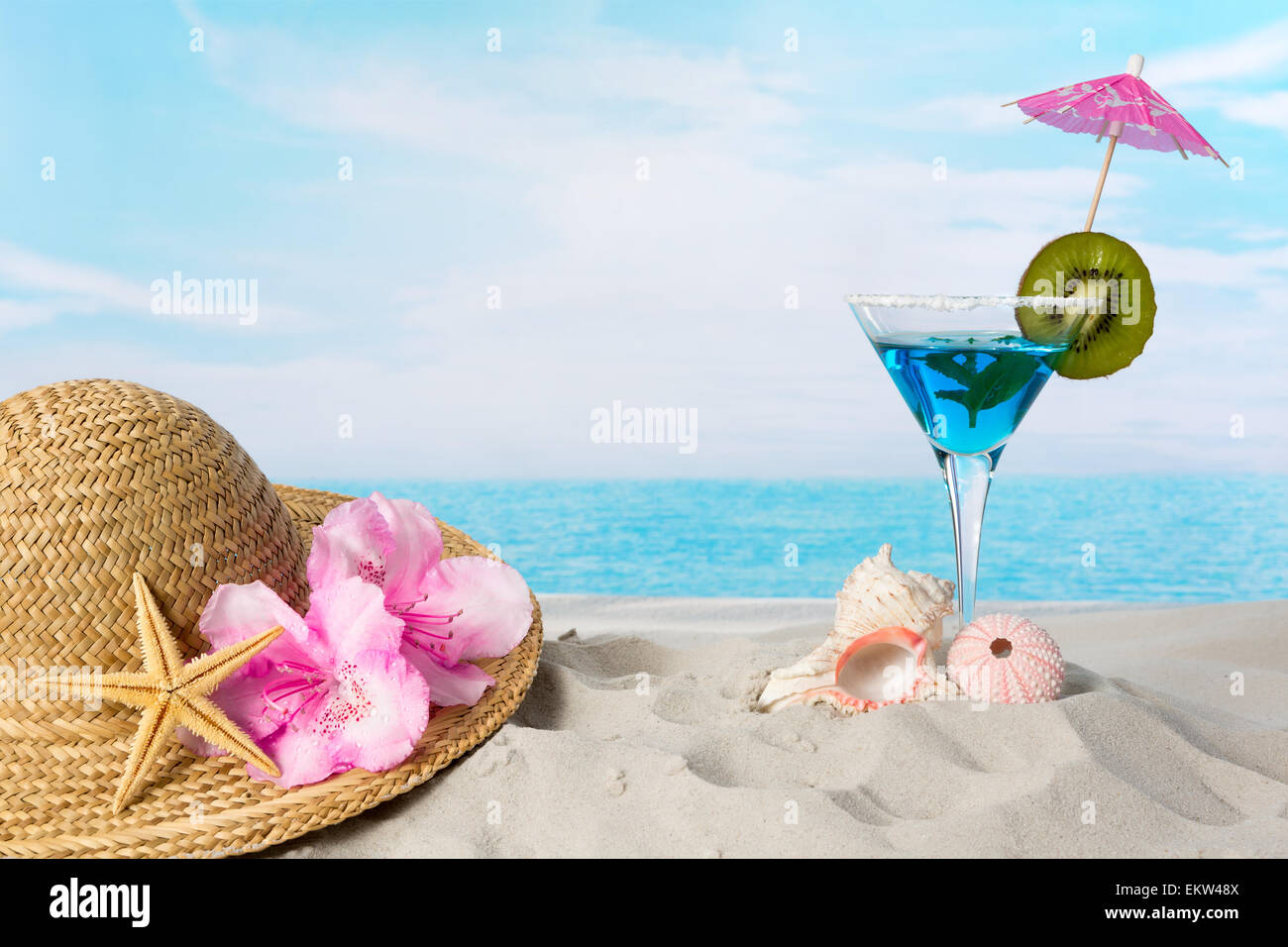 Blue Cocktail On The Beach With A Sunhat And Sea Shells Stock Photo Alamy Blue Cocktail On The Beach With A Sunhat And Sea Shells Stock Photo Alamy