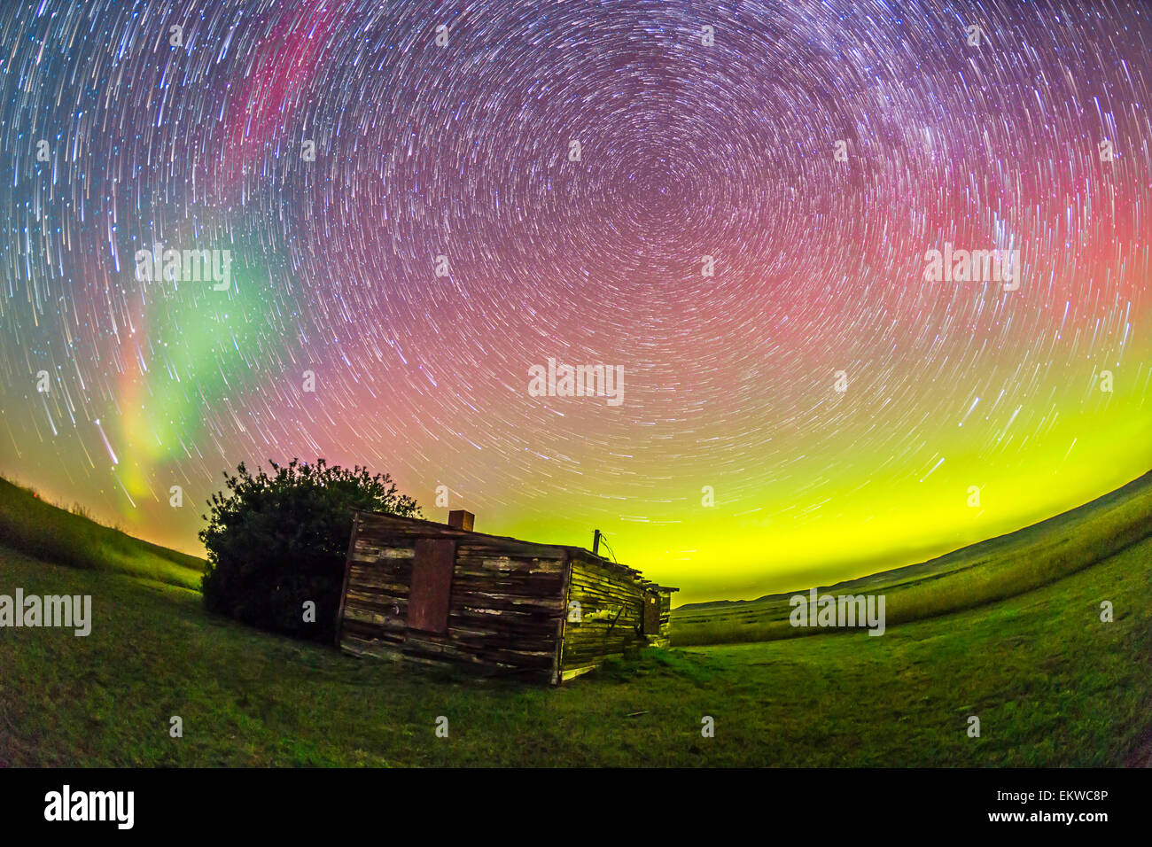 August 27-28, 2014 - Fish-eye lens composite of aurora borealis and circumpolar star trails above the old Larson Ranch site in t Stock Photo