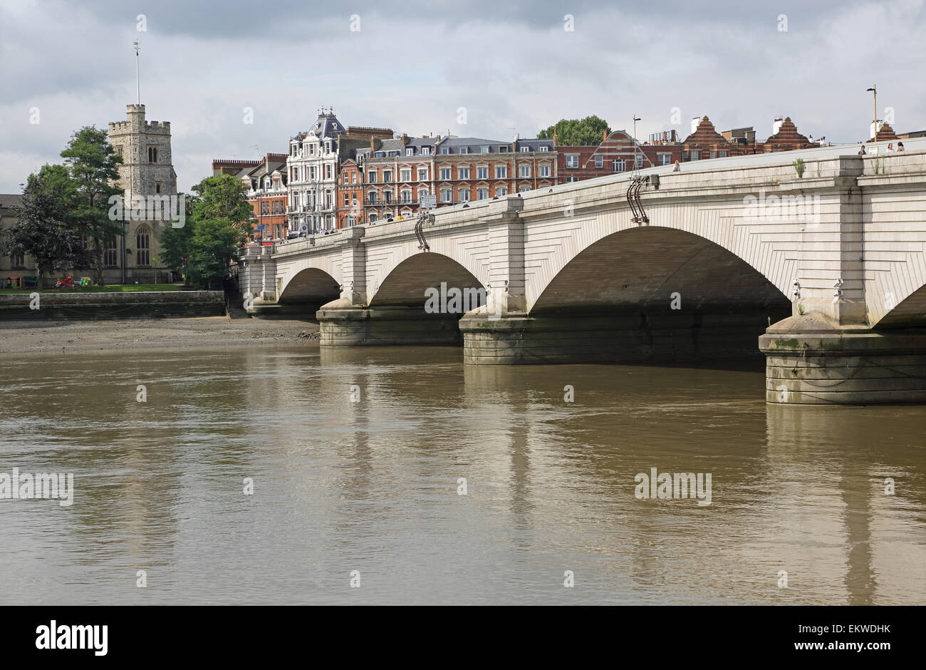Putney Bridge, west London. Viewed from the north east.  Showing the River Thames and the tower of St Mary's church, Putney Stock Photo