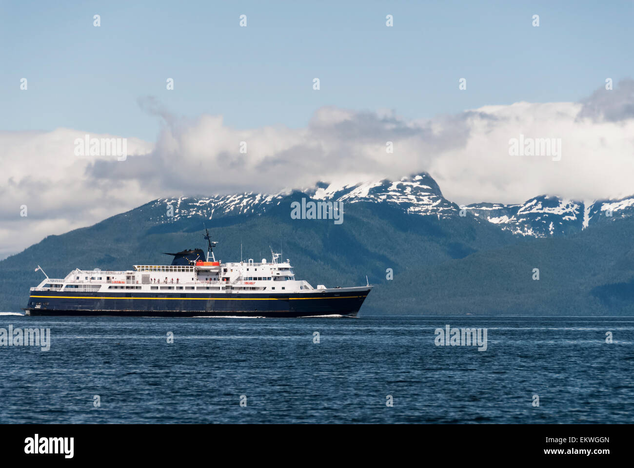 Alaska State Ferry MV Taku crosses Frederick Sound in Southeast Alaska; Coast Range in background Stock Photo
