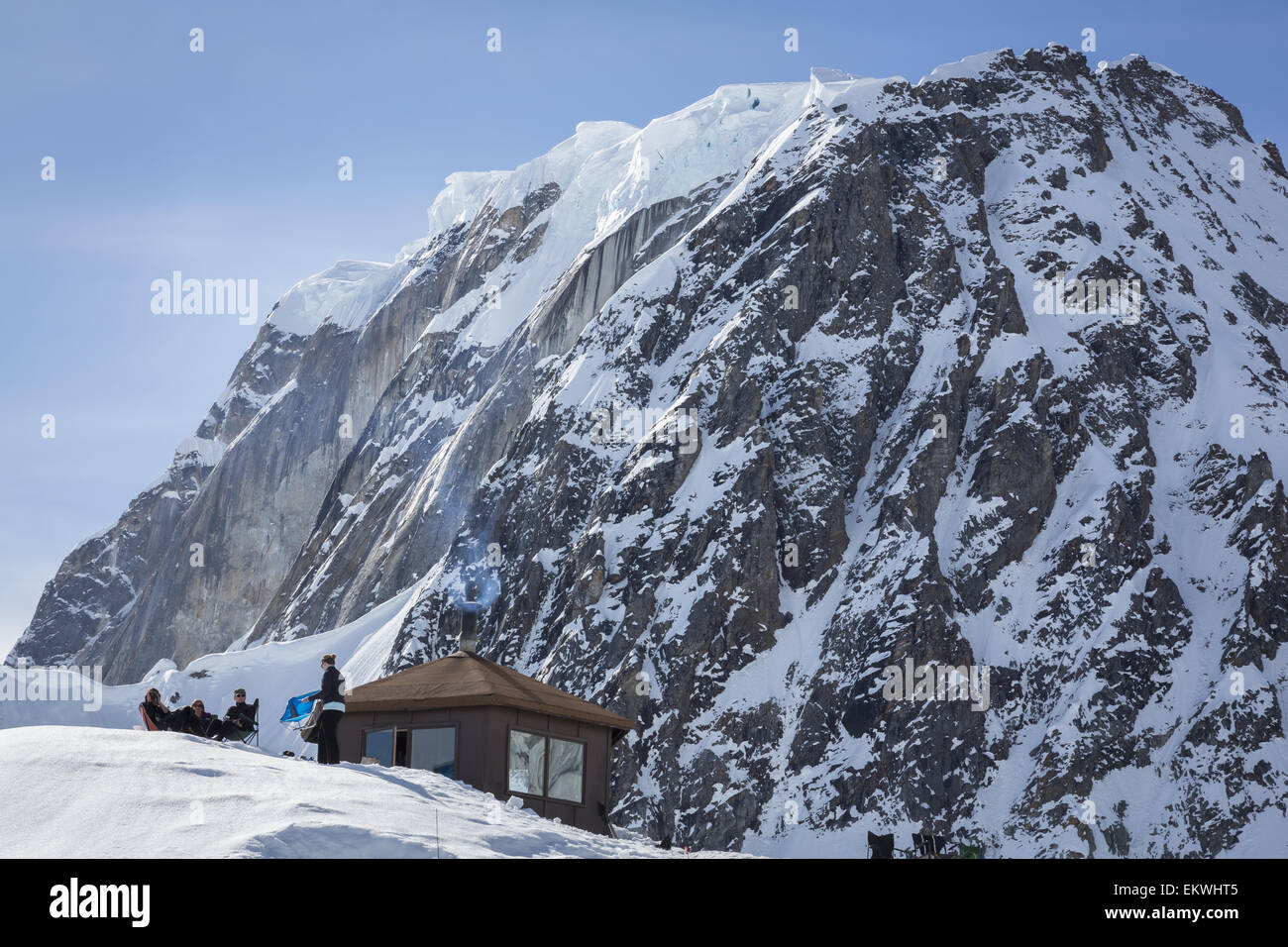 A group of mountaineers relaxing at the Don Sheldon Mountain House in