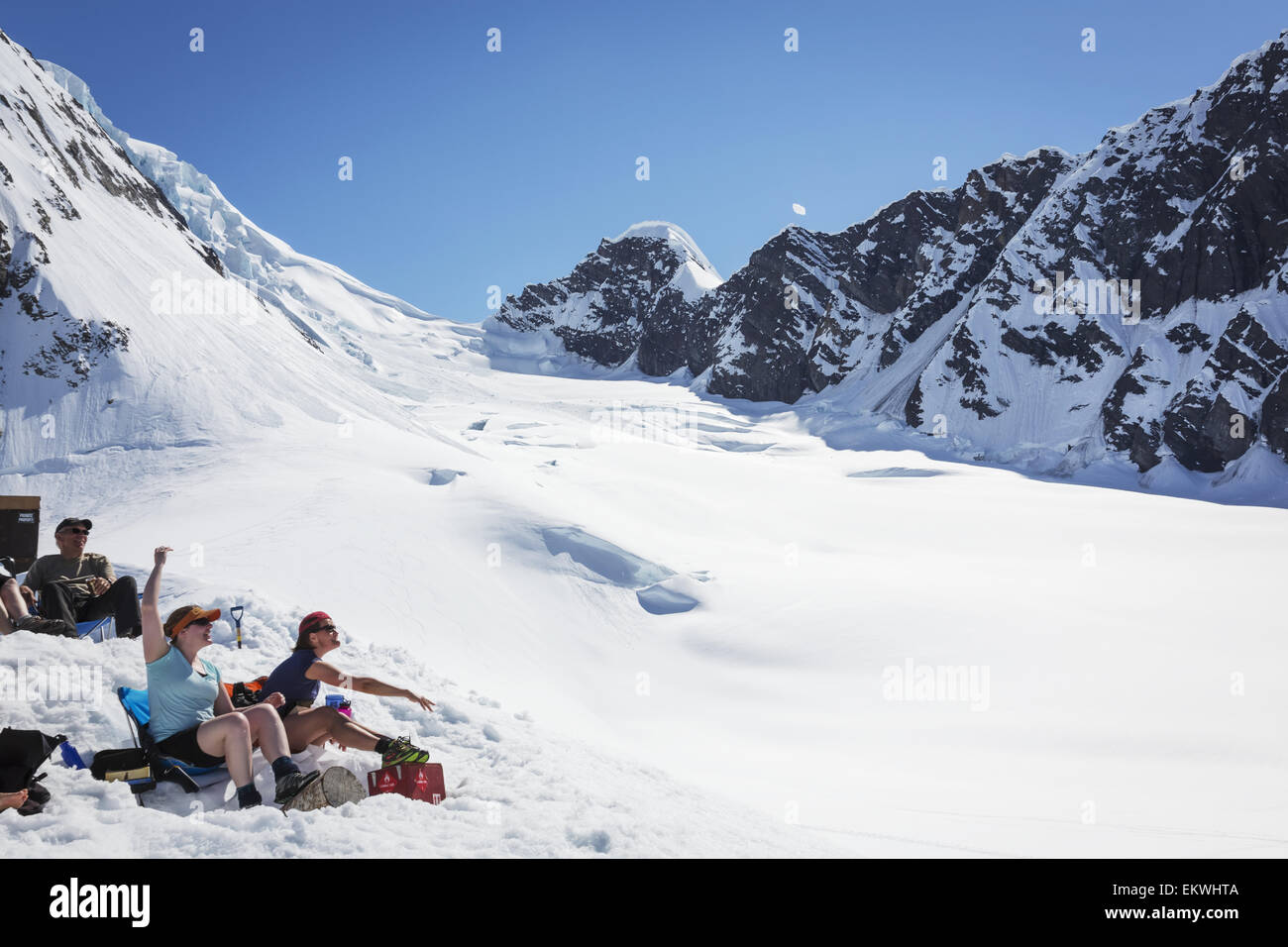 A group of visitors to the Don Sheldon Mountain House relaxing and