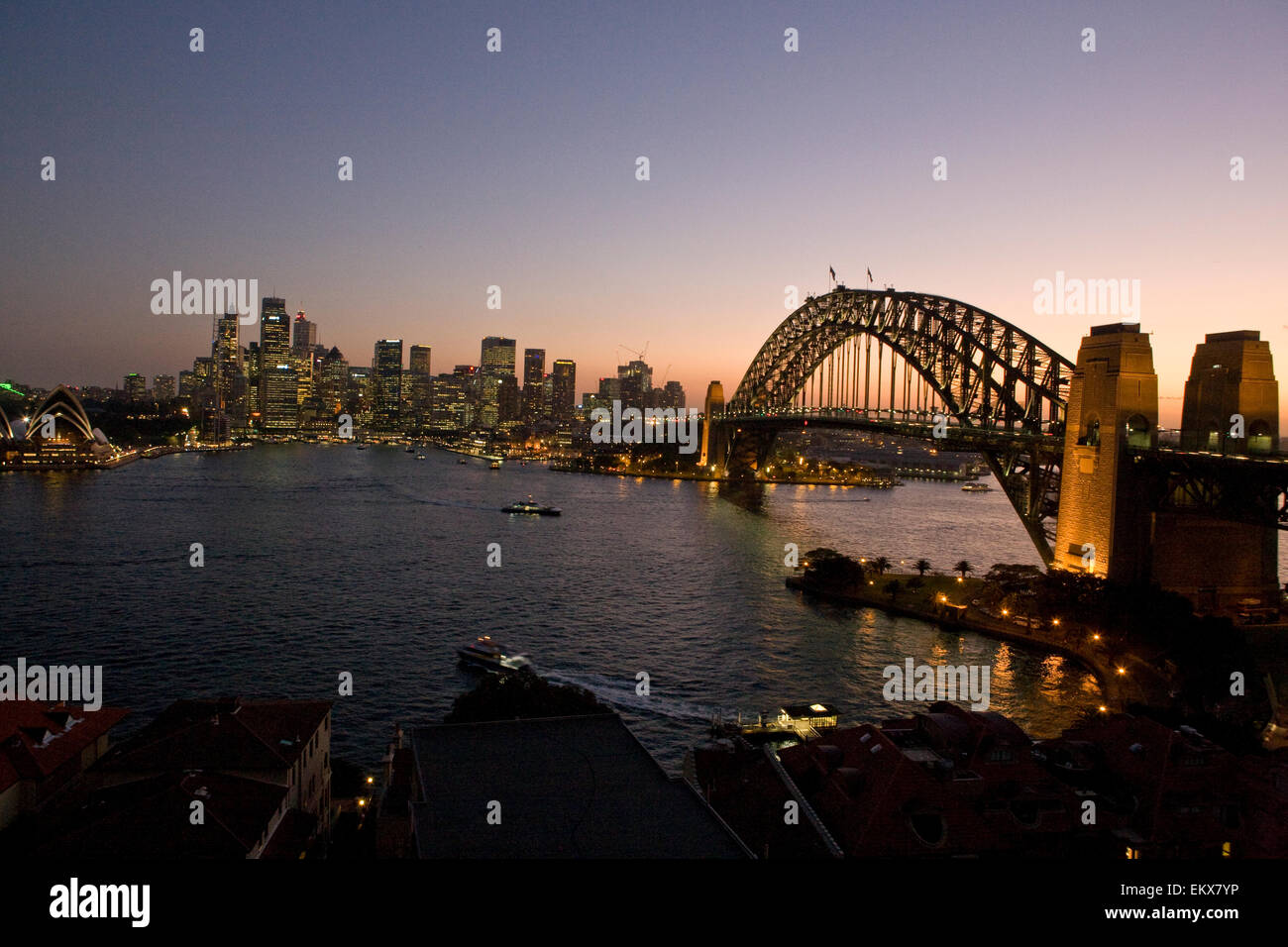 Sydney Harbour Bridge and Circular Quay, Sydney, Australia at sunset Stock Photo
