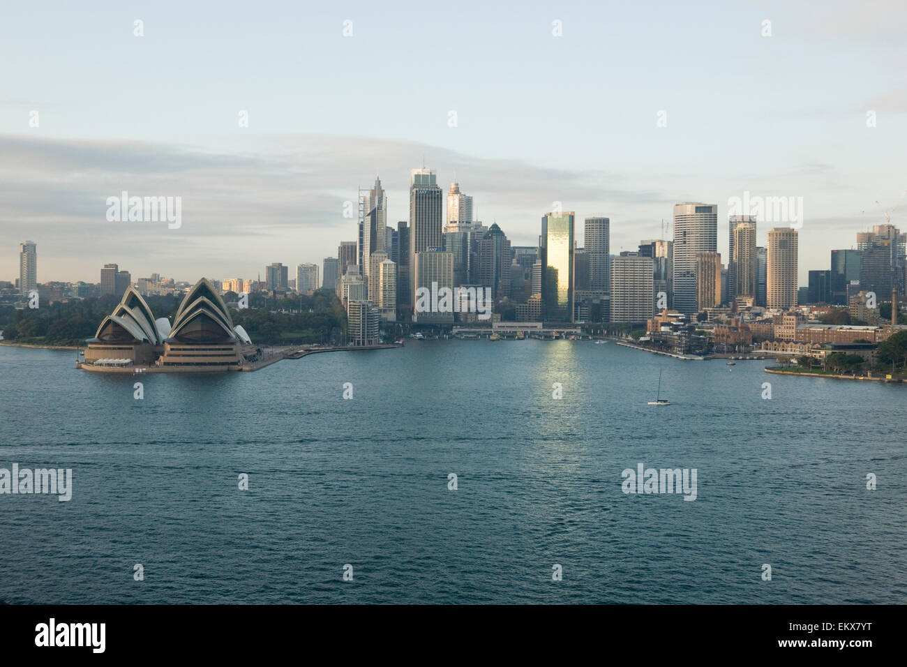 View of Sydney skyline and harbour including The Sydney Opera House, Circular Quay with office blocks that make up the cityscape Stock Photo