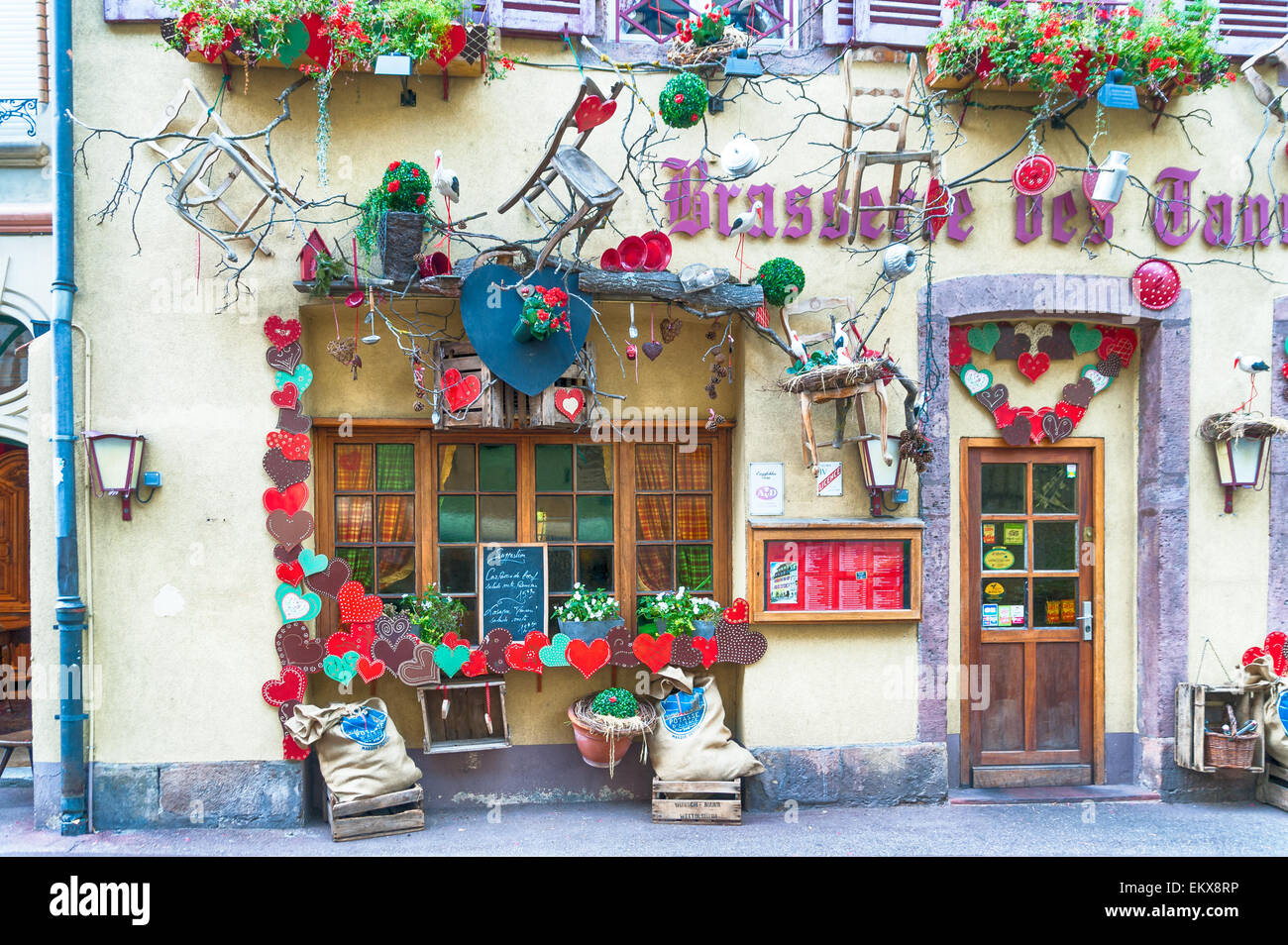 decorated facade of a restaurant in alsace Stock Photo - Alamy