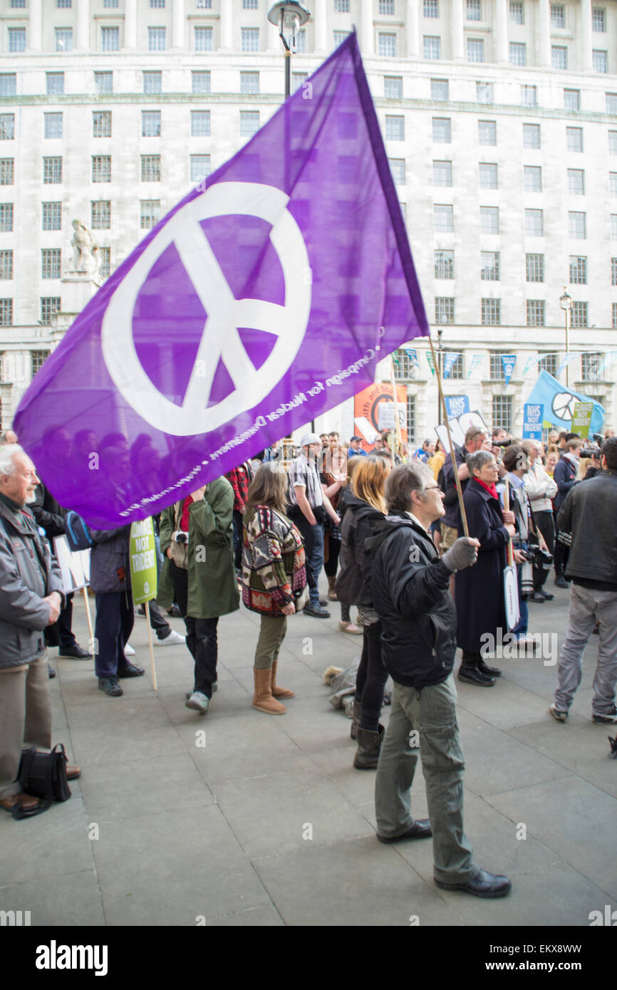 Whitehall, London, UK. 13th April, 2015. Vote Out Trident, an evening of Party and Protest against the renewal of Trident outside the Ministry of Defence building. Credit:  Paul Mendoza/Alamy Live News Stock Photo