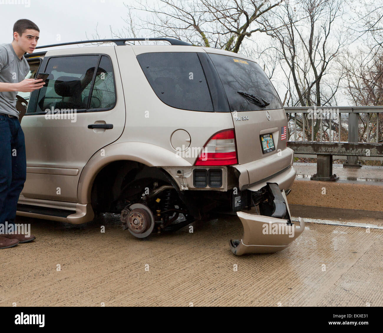 Missing wheel on car at an accident scene USA Stock Photo Alamy