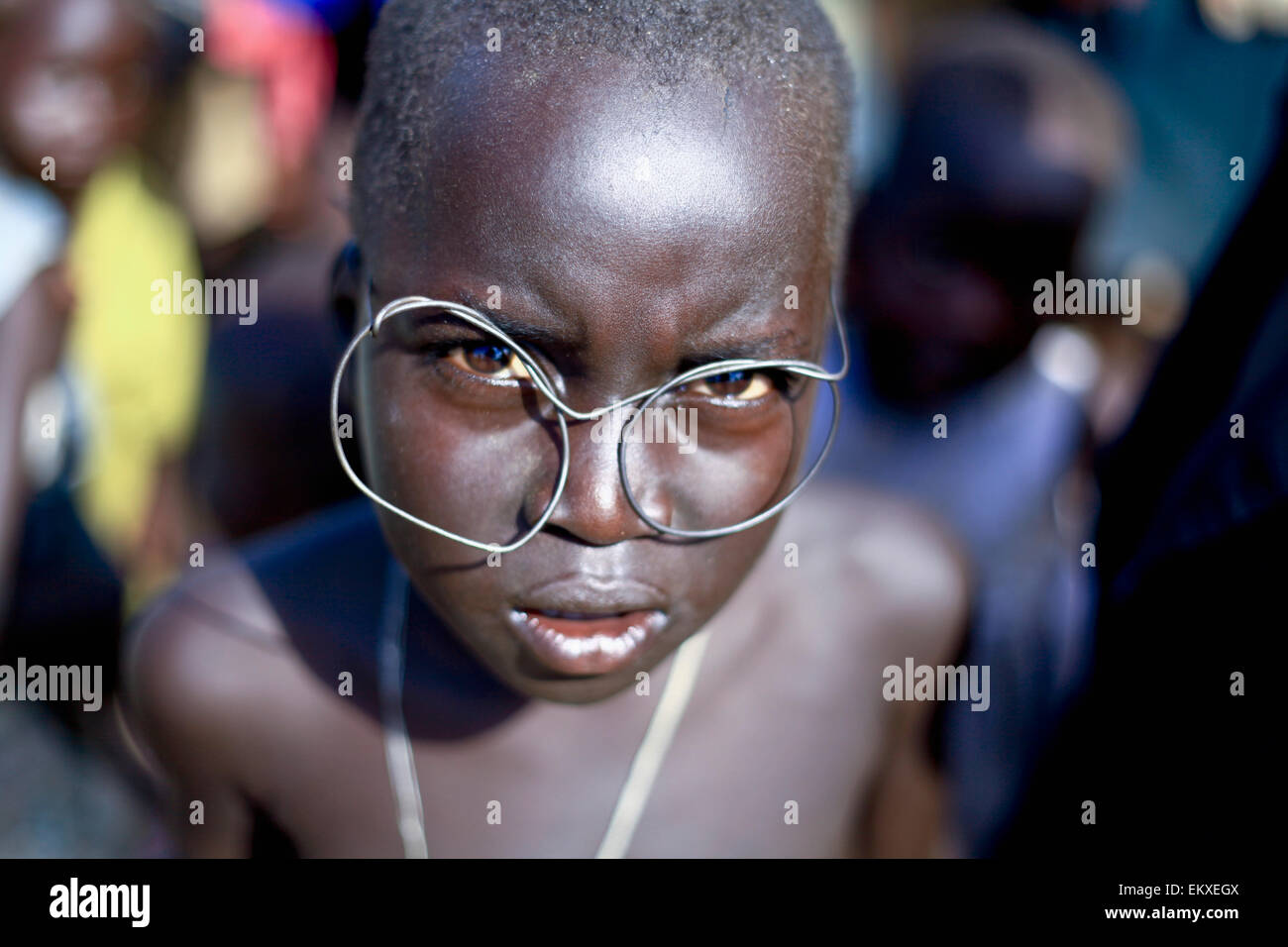 Crooked Wire Rimmed Glasses On A Boy; Kampala Uganda Africa Stock Photo -  Alamy