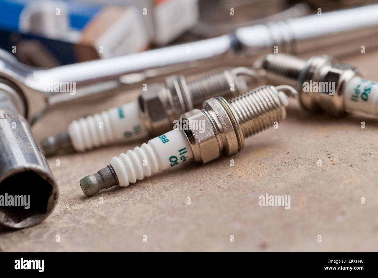 Car spark plugs and repair tools - USA Stock Photo