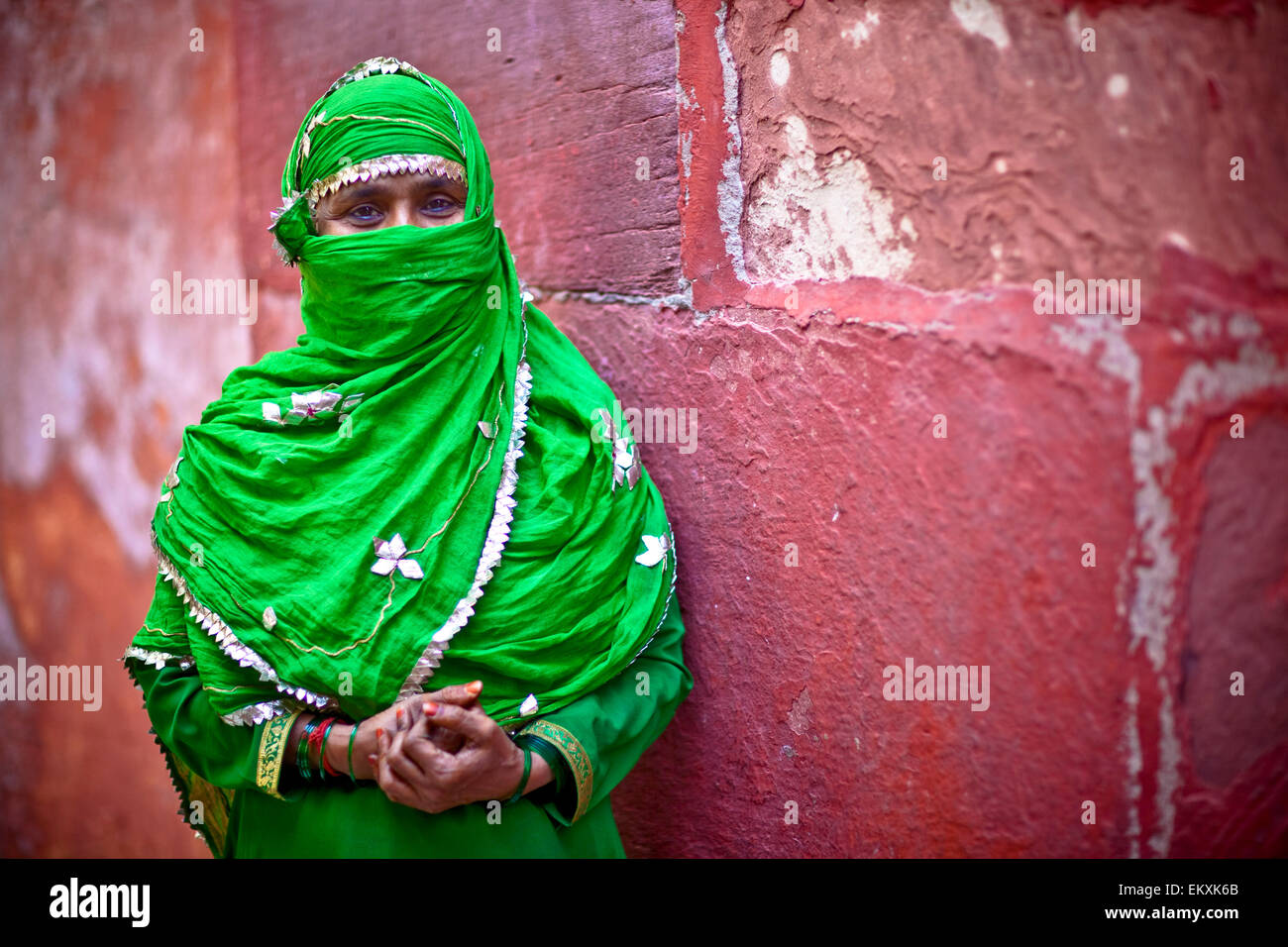 A Muslim Woman In A Green Scarf (A Duptta) Smiles For The Camera With ...