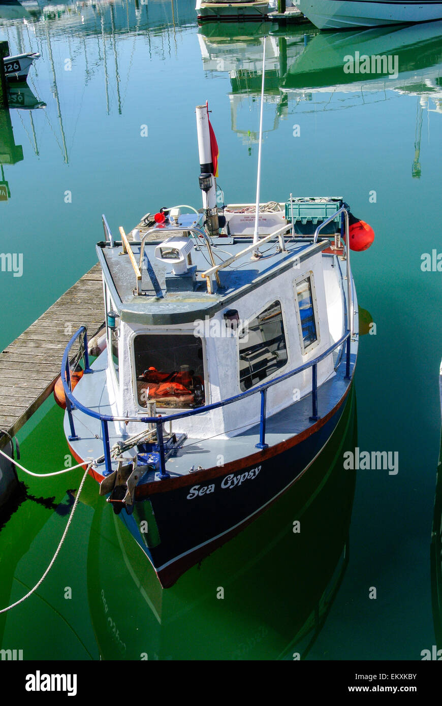 Boat tied in harbour hi-res stock photography and images - Alamy