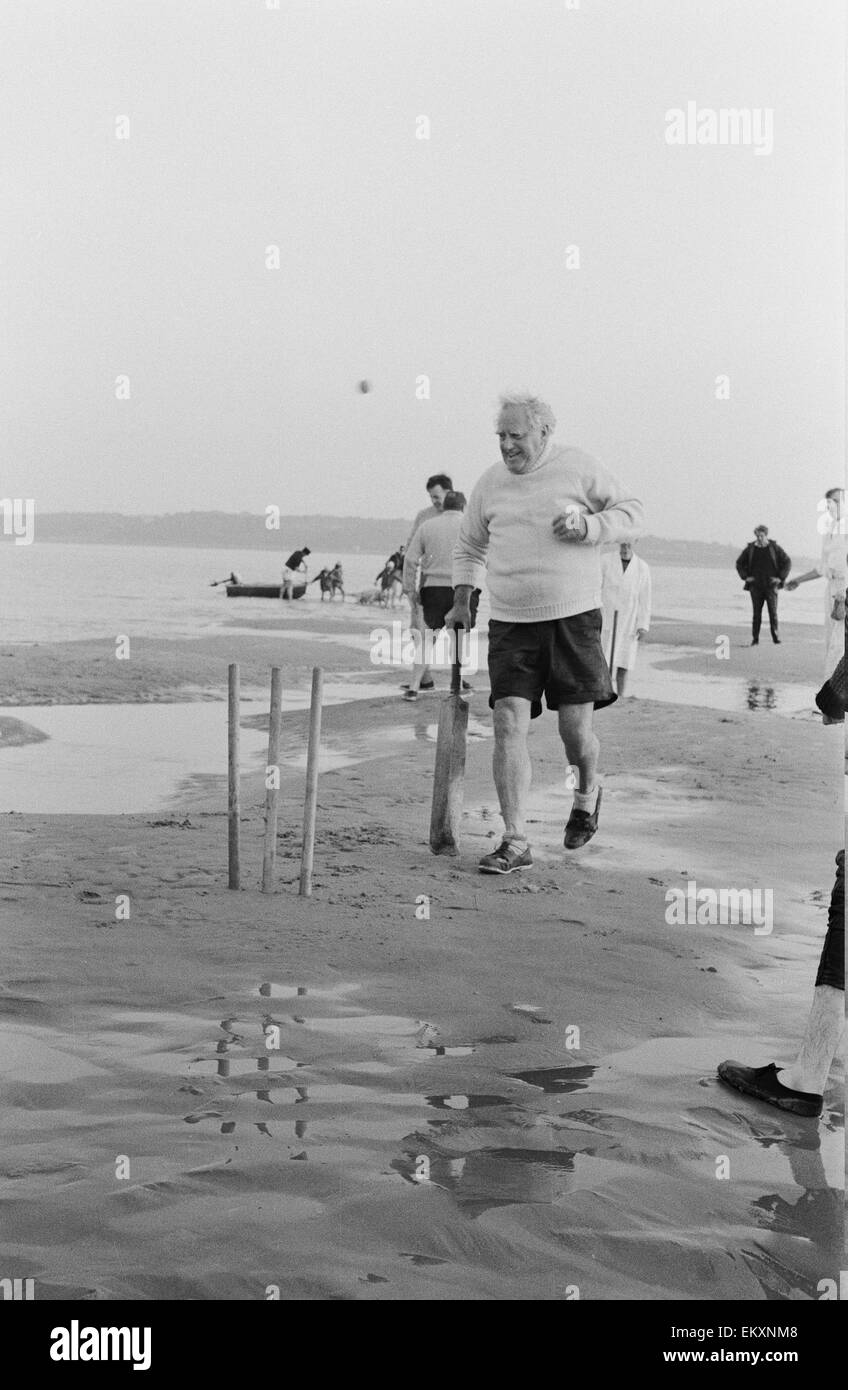 Brambles sandbank cricket match. 'Action' shots from the annual cricket match between the Royal Southern Yacht Club and the Island Sailing Club on a sandbank on the Isle of Wight. 18th September 1966 Stock Photo
