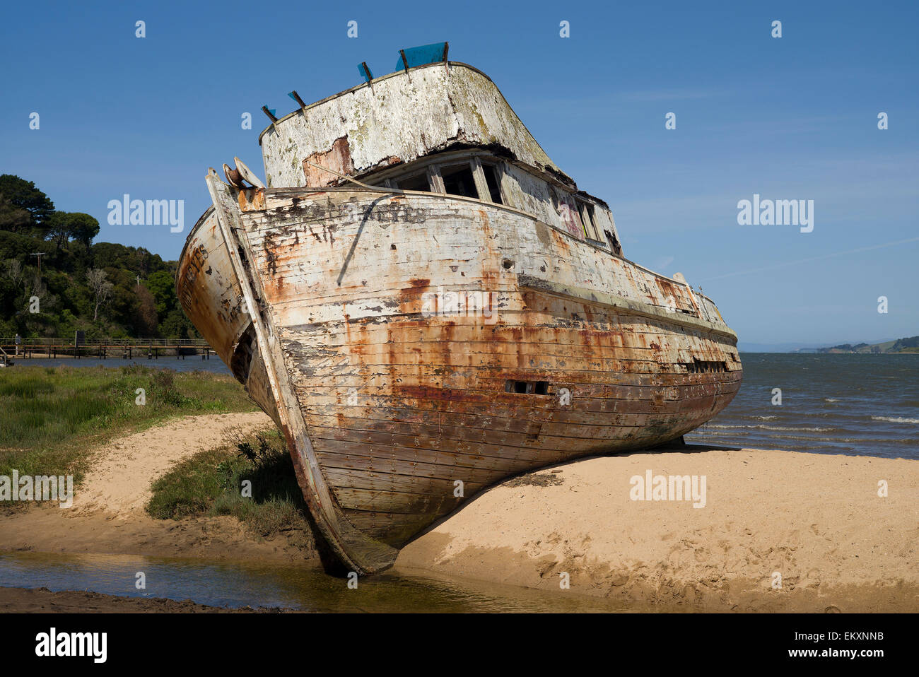 The boat Point Reyes is seen grounded on a sandbar in Tomales Bay in Inverness, California. Stock Photo