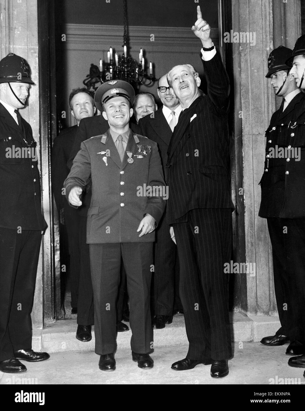 Yuri Gagarin the first man in space seen here with Prime Minister Harold MacMillan on the steps of Admiralty House. MacMillan points to the sky as he bids the young Russian cosmonaut farewell. 13th July 1961 Stock Photo