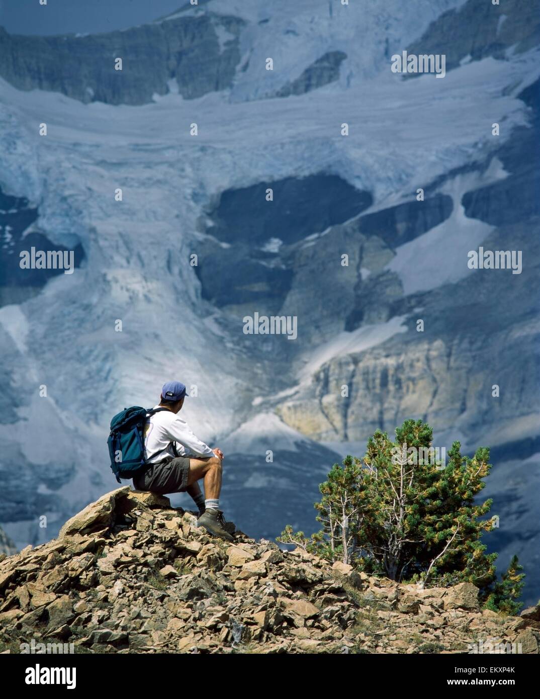 Mature hiker sitting rocky hi-res stock photography and images - Alamy