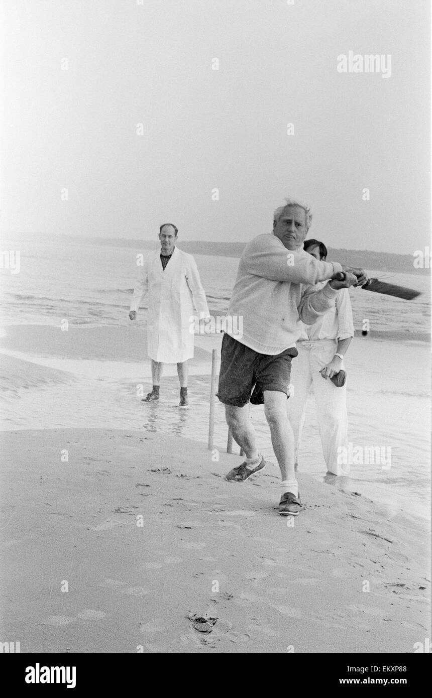 Brambles sandbank cricket match. 'Action' shots from the annual cricket match between the Royal Southern Yacht Club and the Island Sailing Club on a sandbank on the Isle of Wight. 18th September 1966 Stock Photo