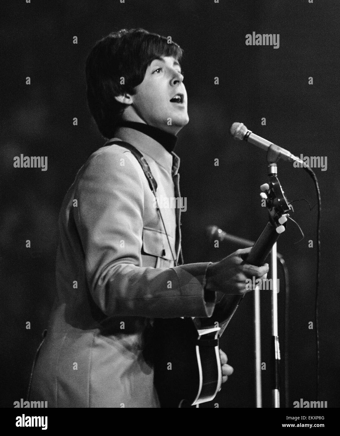 New Musical Express pop concert at Empire Pool Wembley 11th April 1965. The annual IPC New Musical Express concert featured poll winners & guest artists including: The Beatles Pictured: Paul McCartney beatexhib12 Stock Photo
