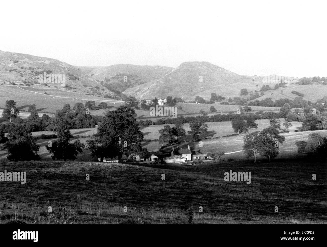 Dovedale lying betwen Bunster Hill (left) and Thorpe Cloud (right) in Derbyshire. 1970 Stock Photo