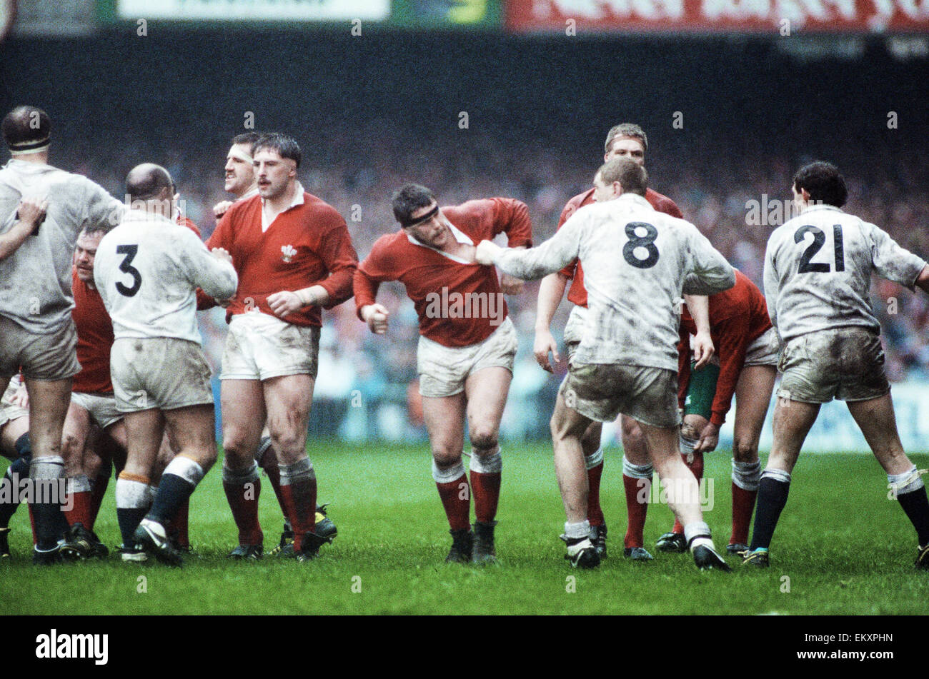 England and Bath prop Gareth Chilcott number 3 and Dean Richard number 8 have a altercation with some of the welsh team during the Wales v England five nations championship match at Cardiff Arms Park. 19th March 1989 Stock Photo