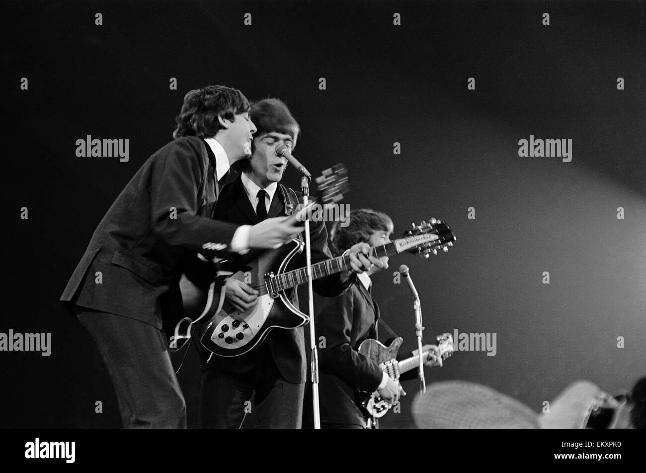 Paul McCartney, George Harrison & John Lennon seen at the New Musical Express pop concert at Empire Pool Wembley 26th April 1964. Stock Photo