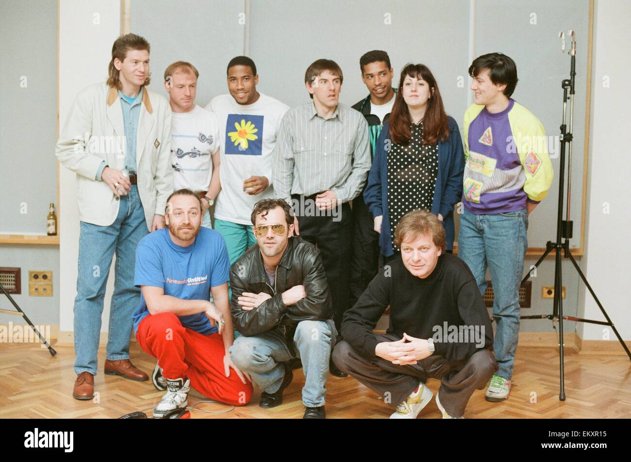 England World Cup Squad in the recording studio after joining music group New Order to record a World Cup Song ahead of the finals in Italy later this year, pictured 25th March 1990. The song will be called World In Motion. Recording studio in Berkshire * Stock Photo