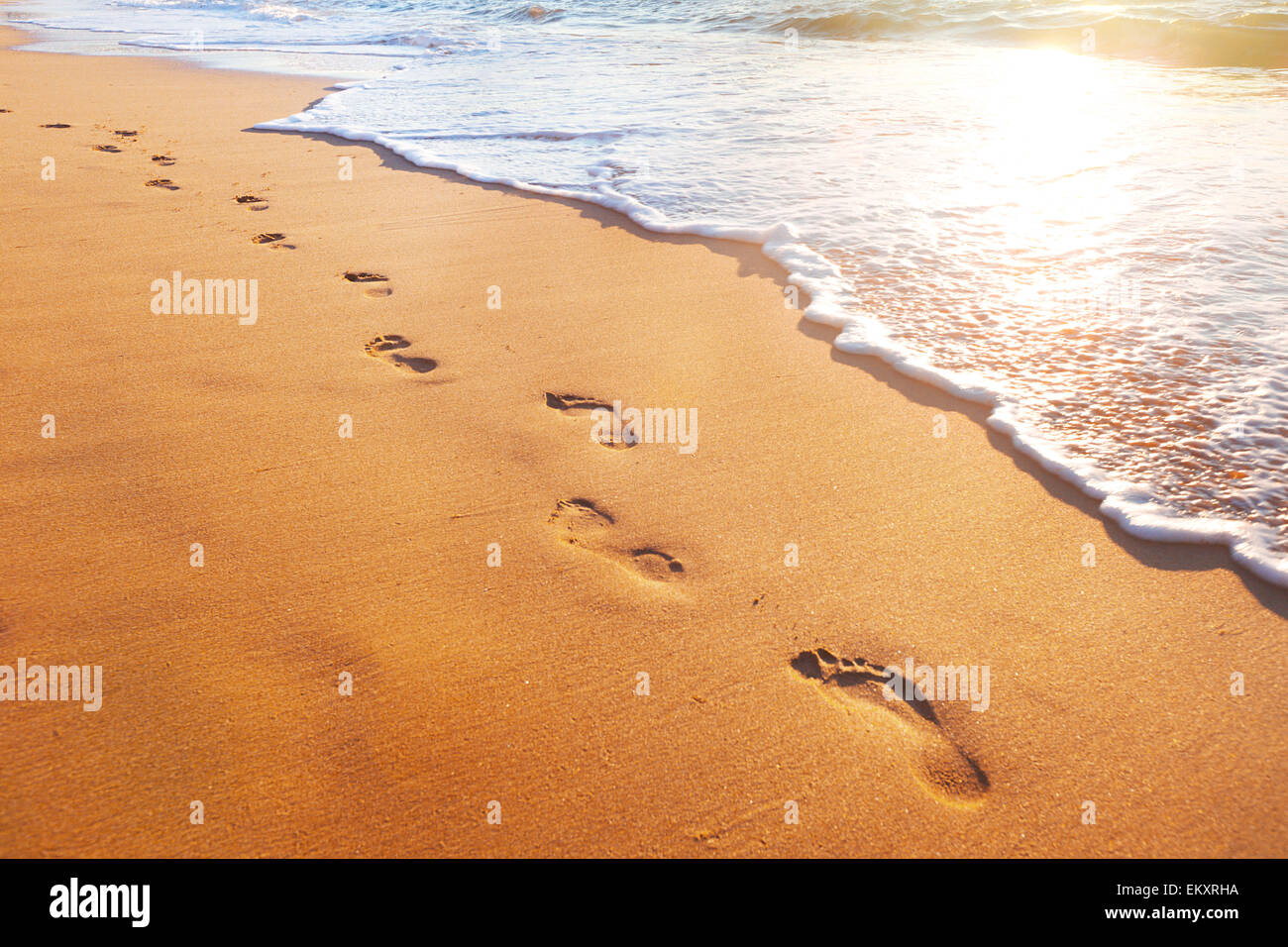beach, wave and footsteps Stock Photo