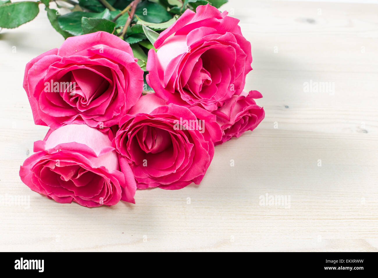 Bouquet of pink roses on white background Stock Photo - Alamy