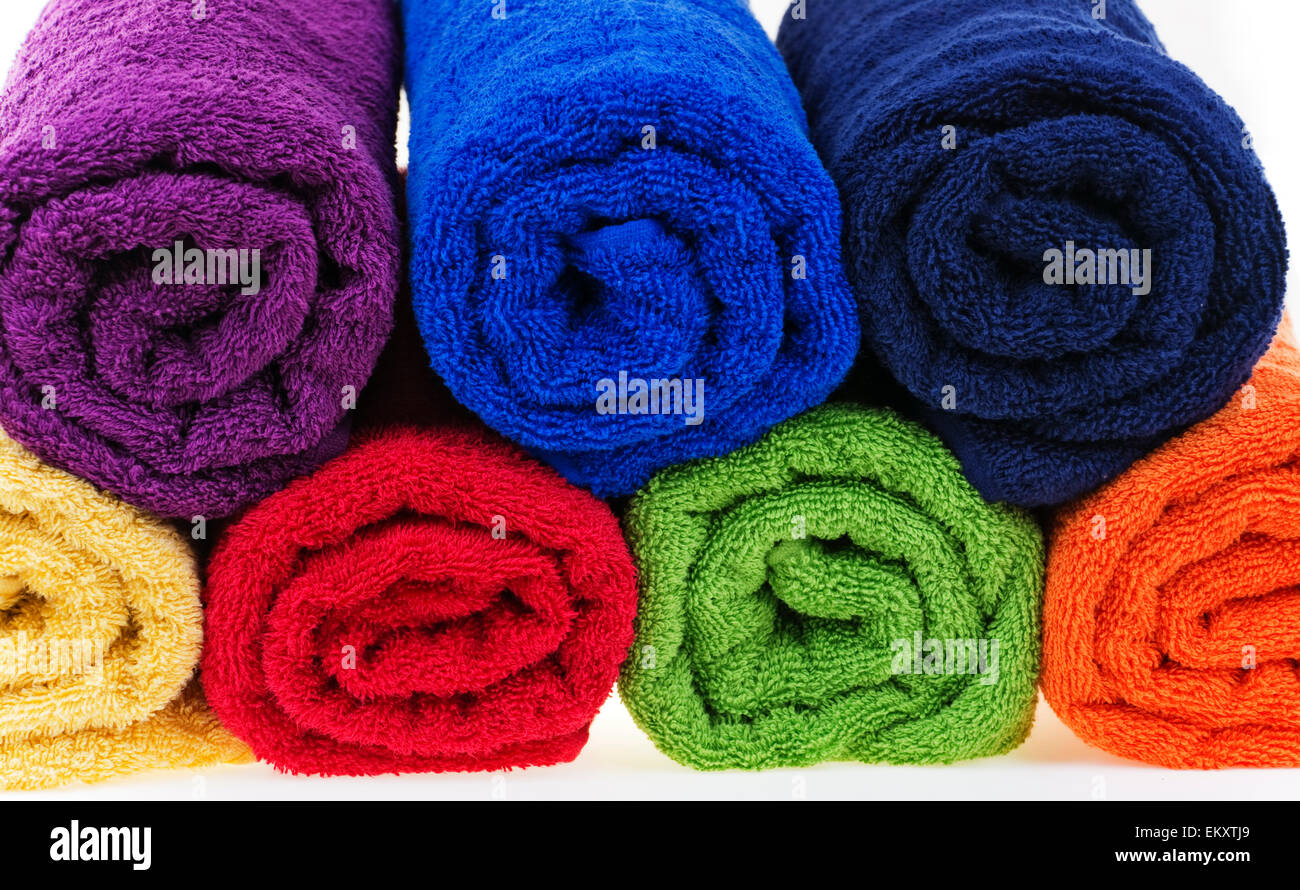 Colorful towels, cotton terry, rolled up. Stock Photo