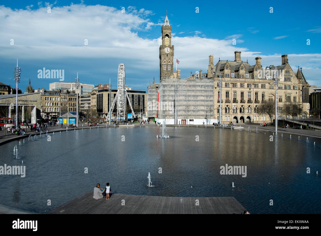 bradford-14th-april-2015-uk-weather-town-hall-and-ferris-wheel-in-city