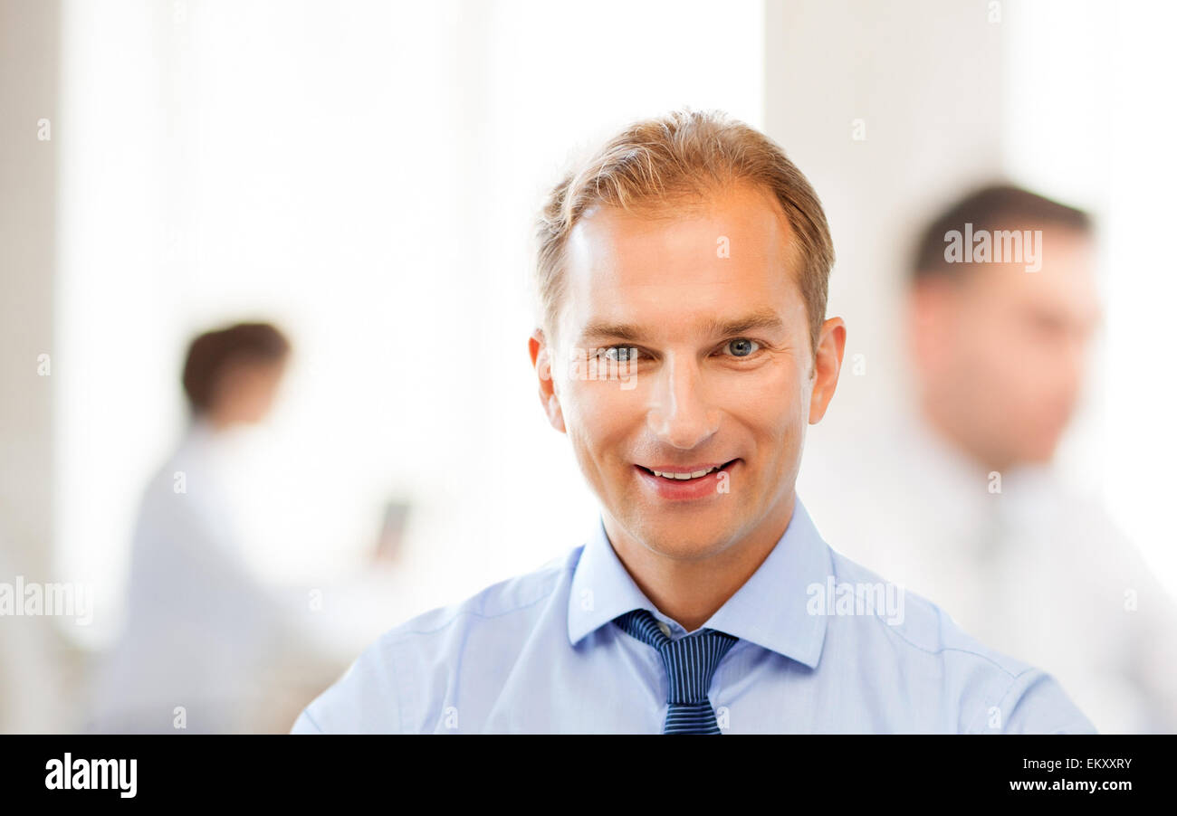 Smiling middle aged businessman work hi-res stock photography and ...