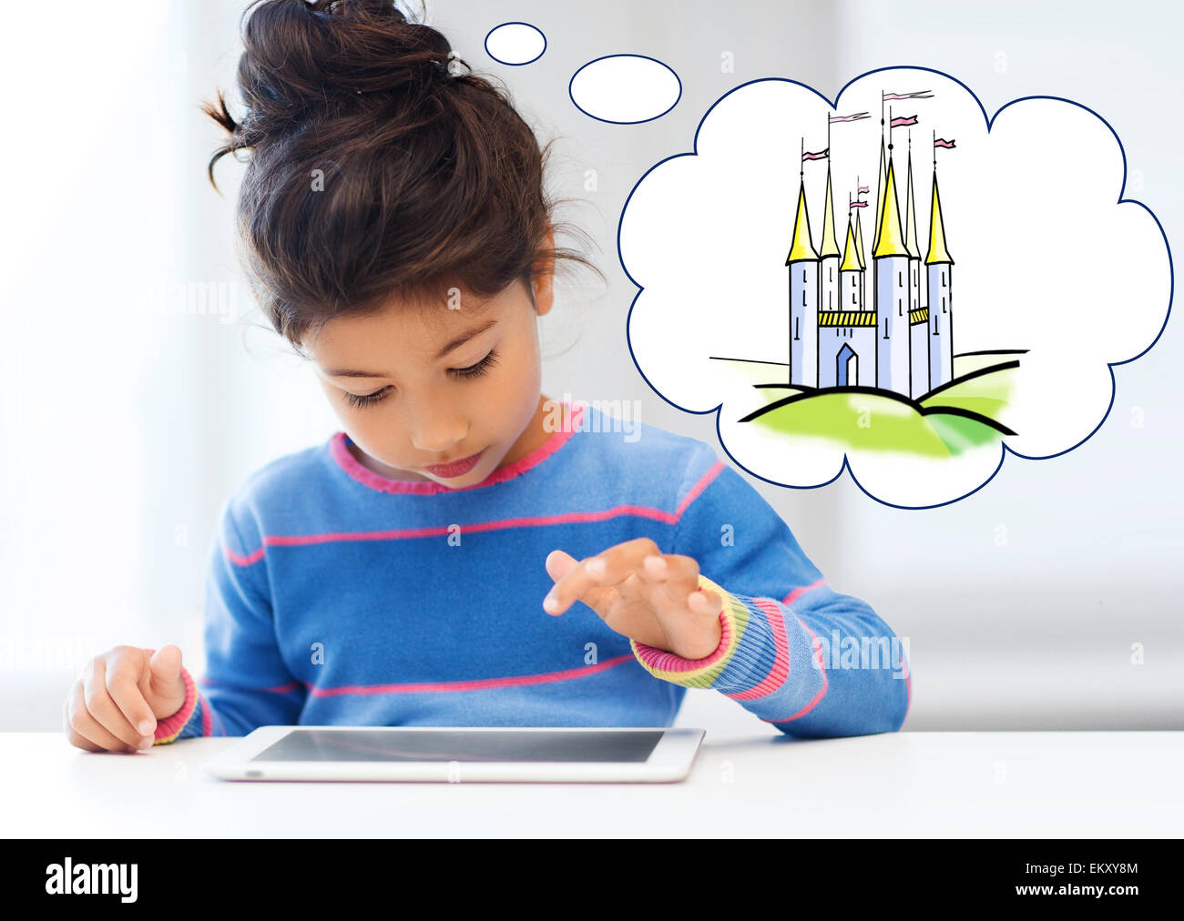little girl with tablet pc at home Stock Photo - Alamy