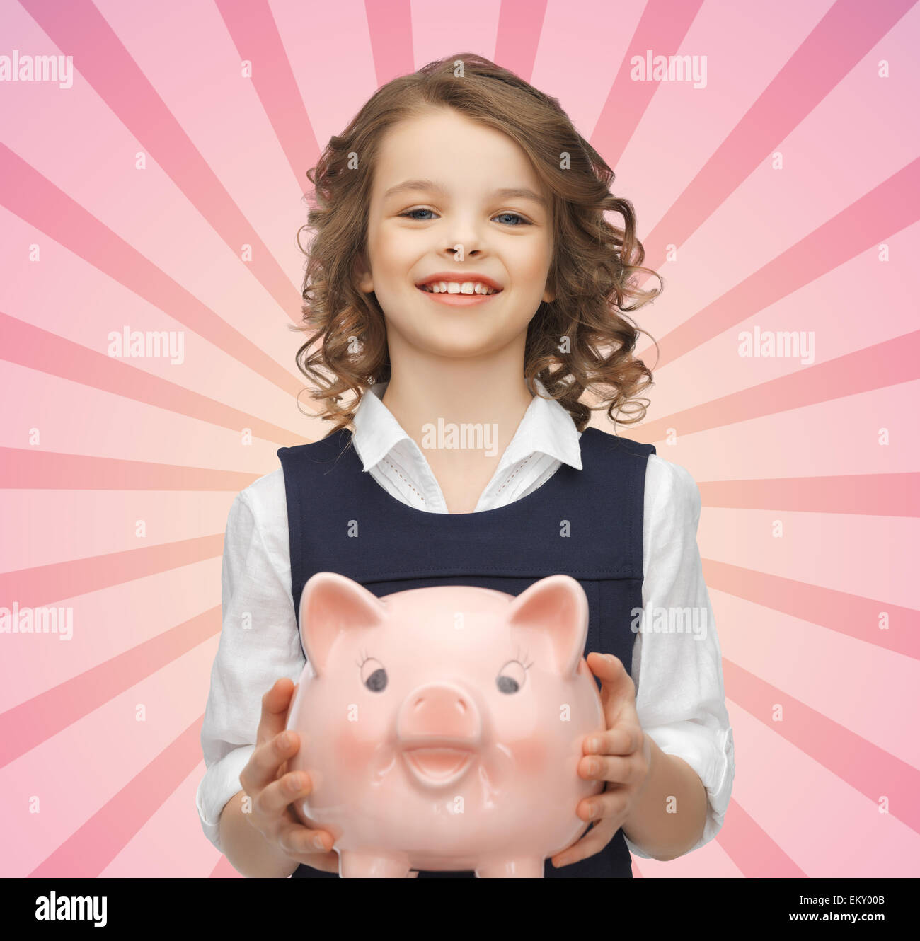 happy girl holding piggy bank Stock Photo - Alamy