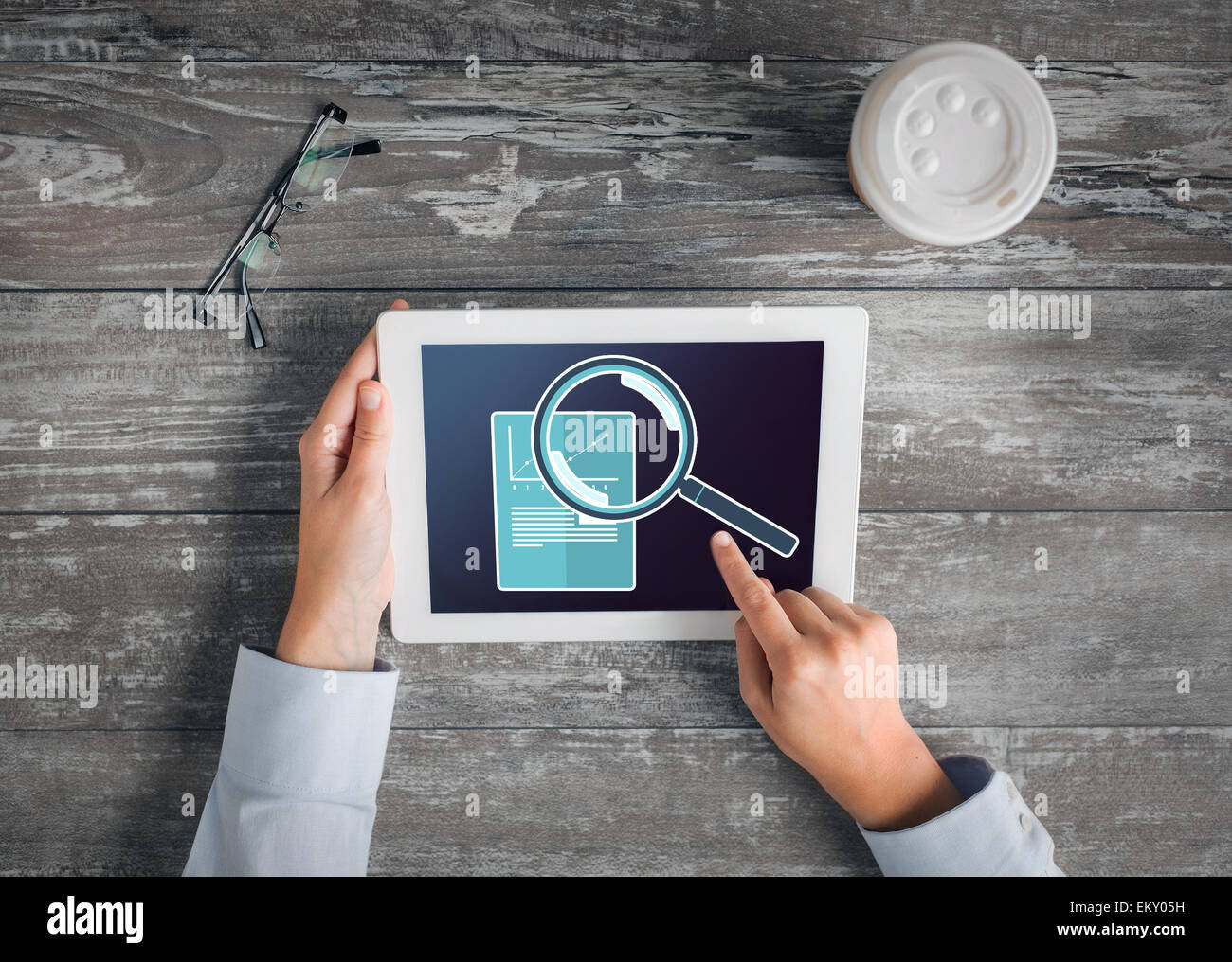 Magnifying glass computer screen chart hires stock photography and