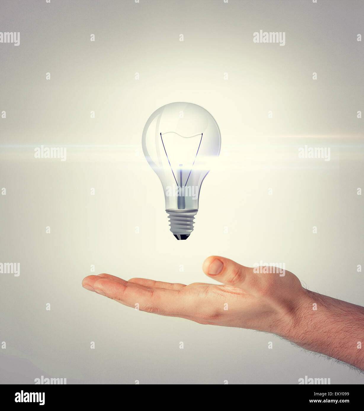 man hand with light bulb Stock Photo - Alamy
