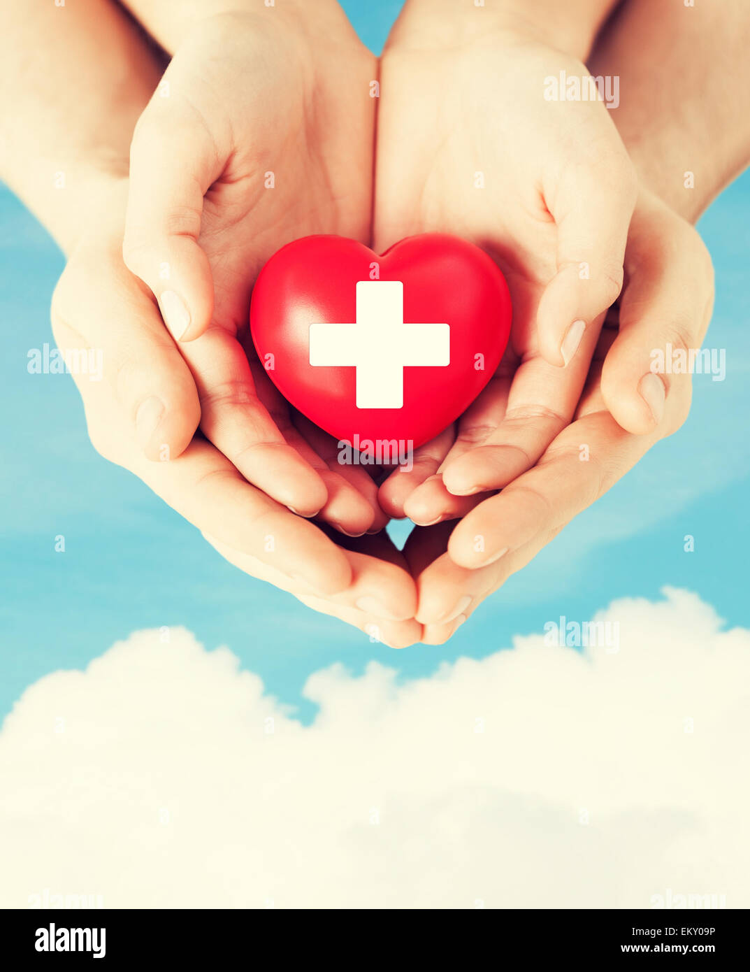 male and female hands with red heart Stock Photo - Alamy