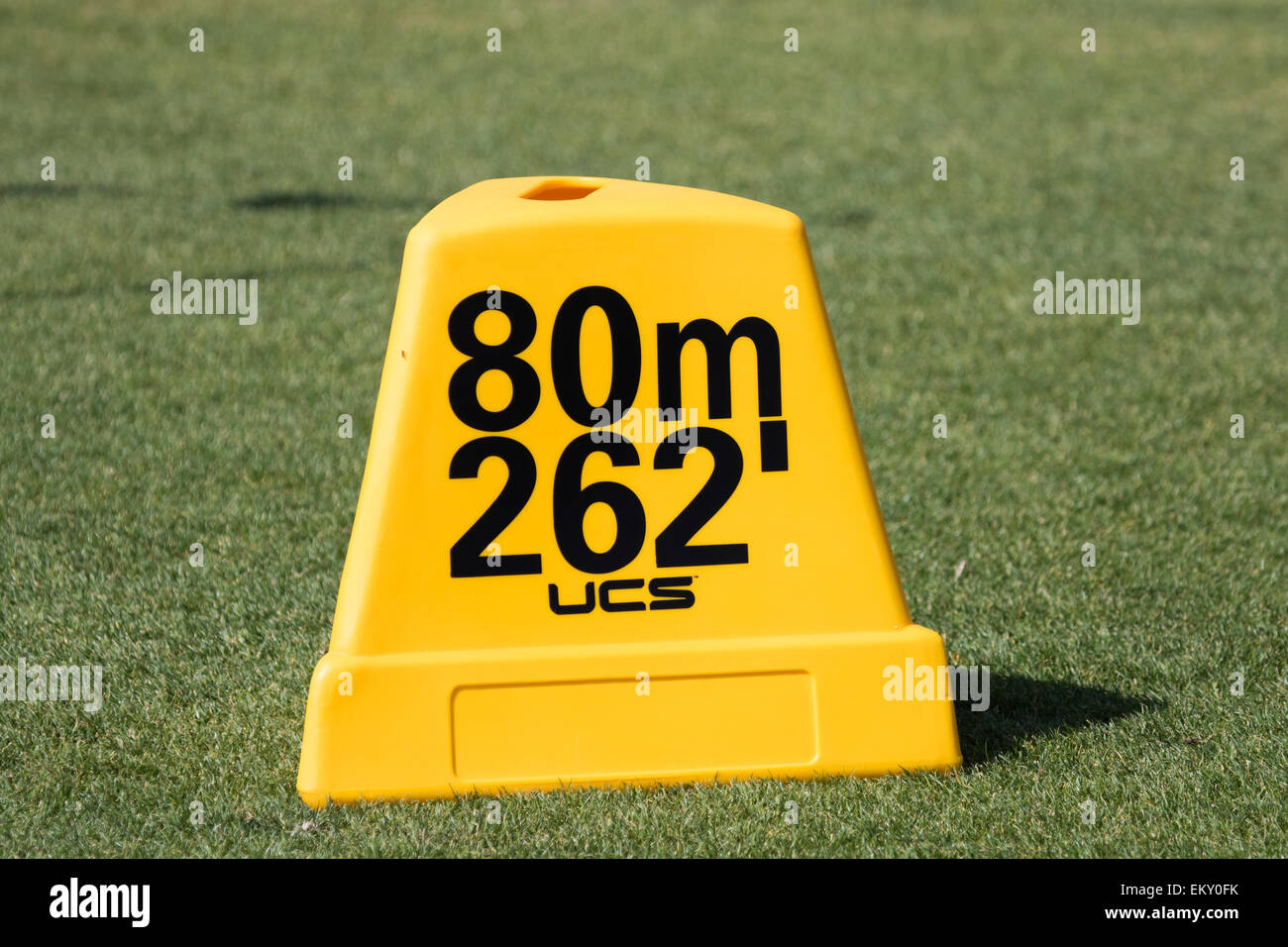 Track And Field Throwing Distance Marker In Feet And Meters Stock Photo Track And Field Throwing Distance Marker In Feet And Meters Stock Photo