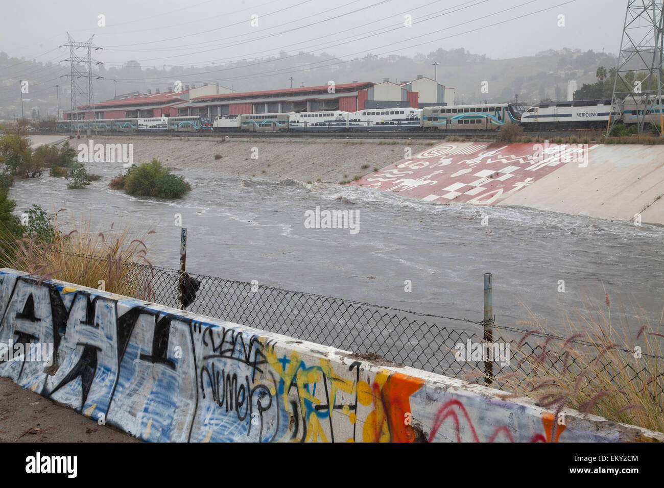 The LA River rises dramatically when a big rainstorm brings much needed water to the Los Angeles area on December 2, 2014. Stock Photo