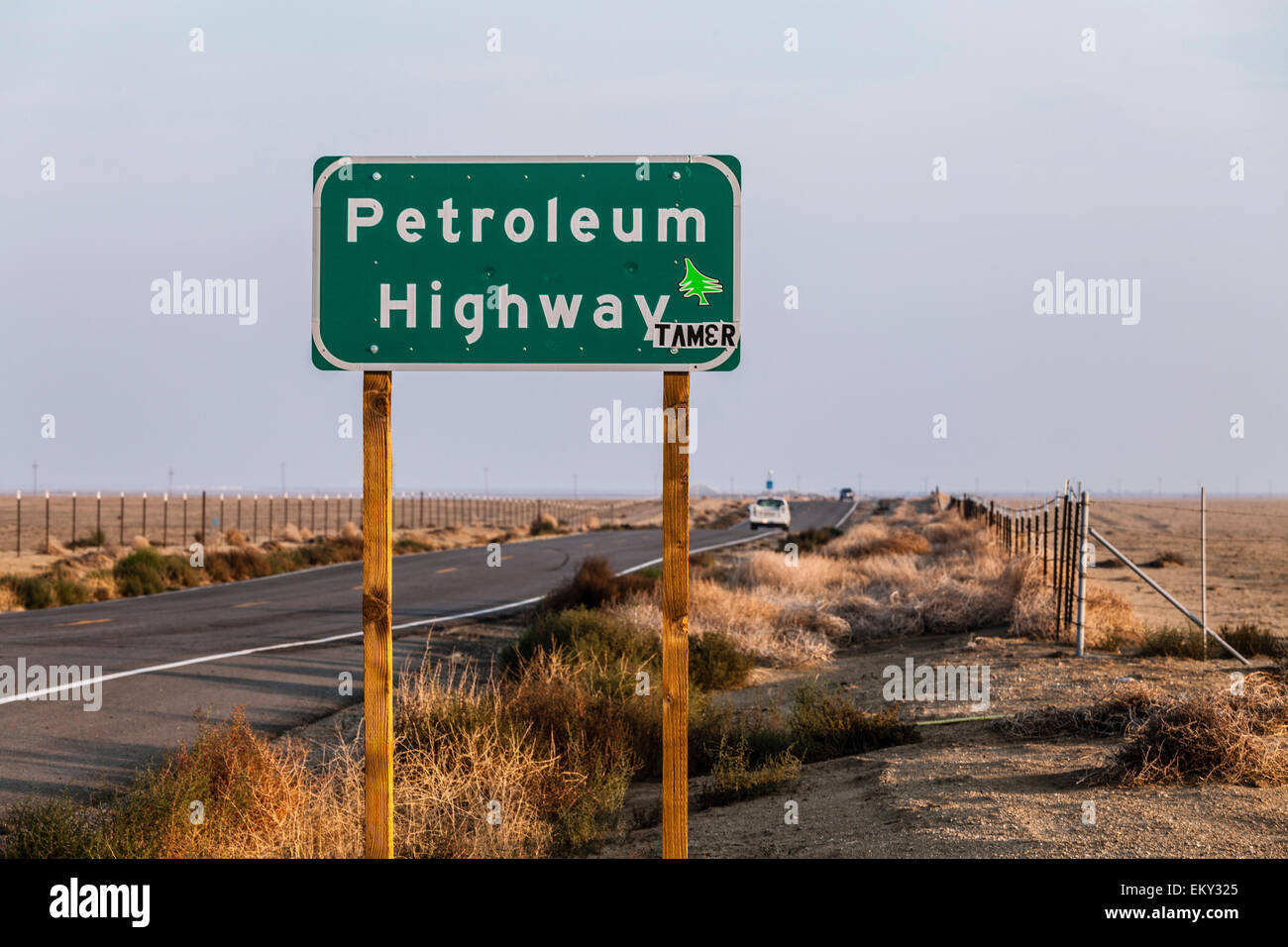 The Petroleum Highway (state route 33) runs north-south through the Belridge oil field in the Monterey Shale. Kern County, CA Stock Photo