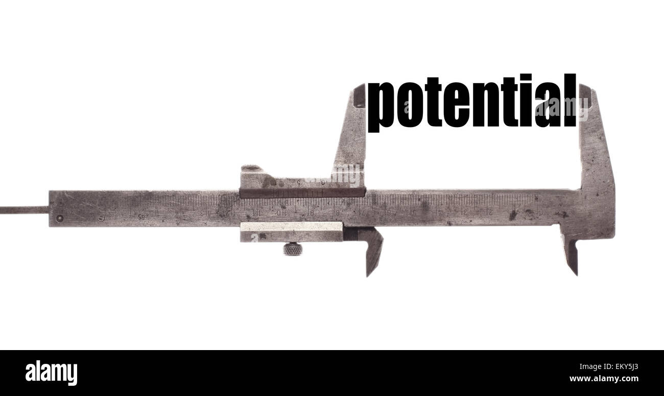 Color horizontal shot of a caliper and measuring the word 'potential'. Stock Photo