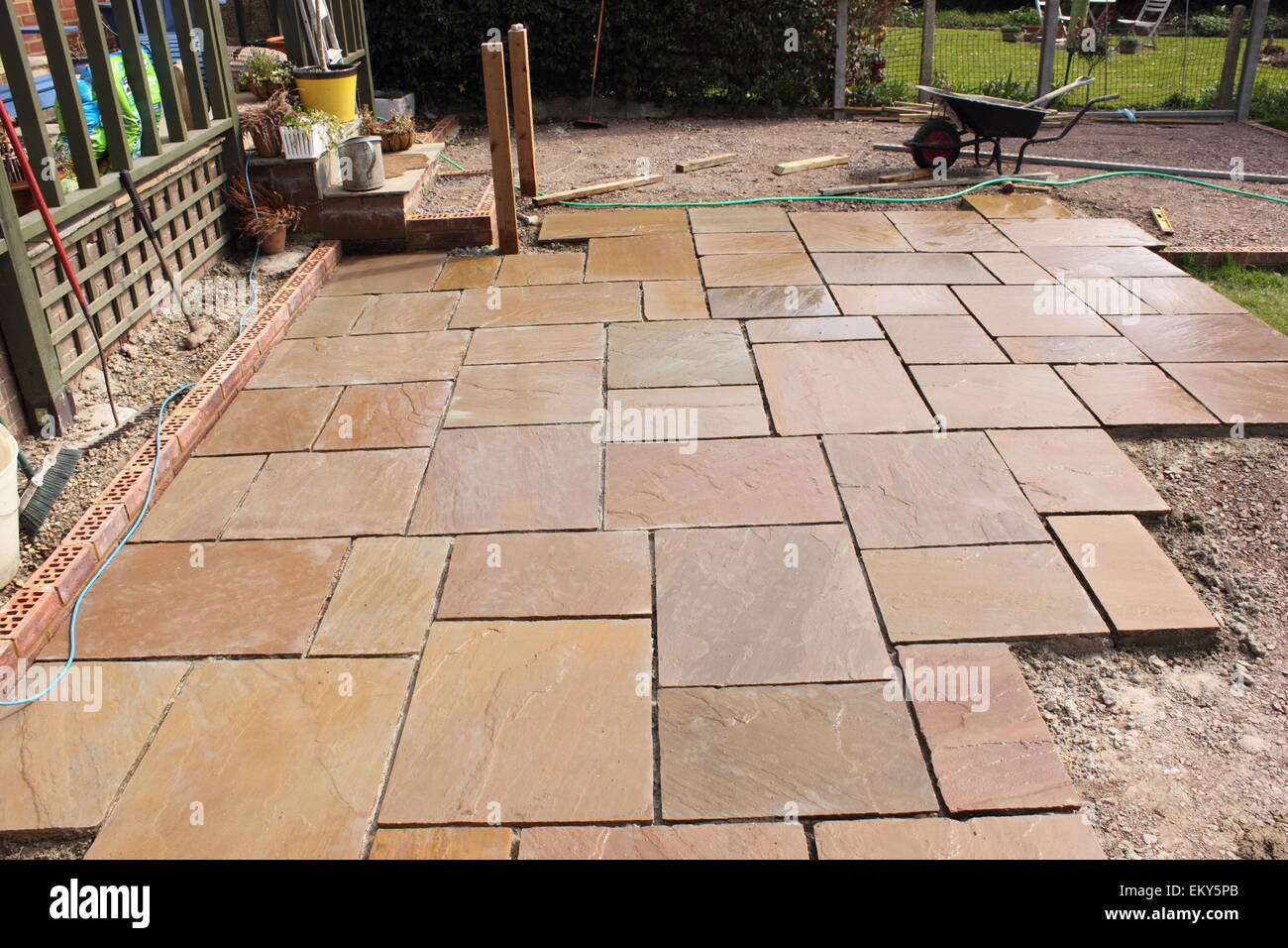 The construction and Building of a natural stone patio Stock Photo Alamy