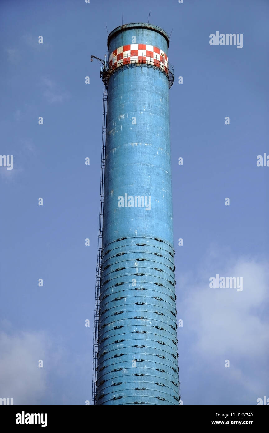 Industrial shot with one blue smoke tower of a thermal power plant Stock Photo