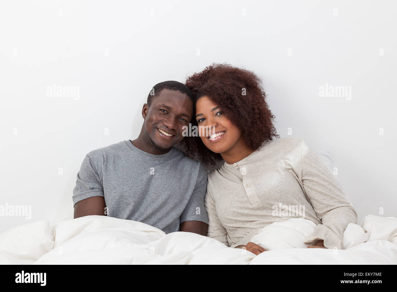 African couple in love on the bed Stock Photo - Alamy