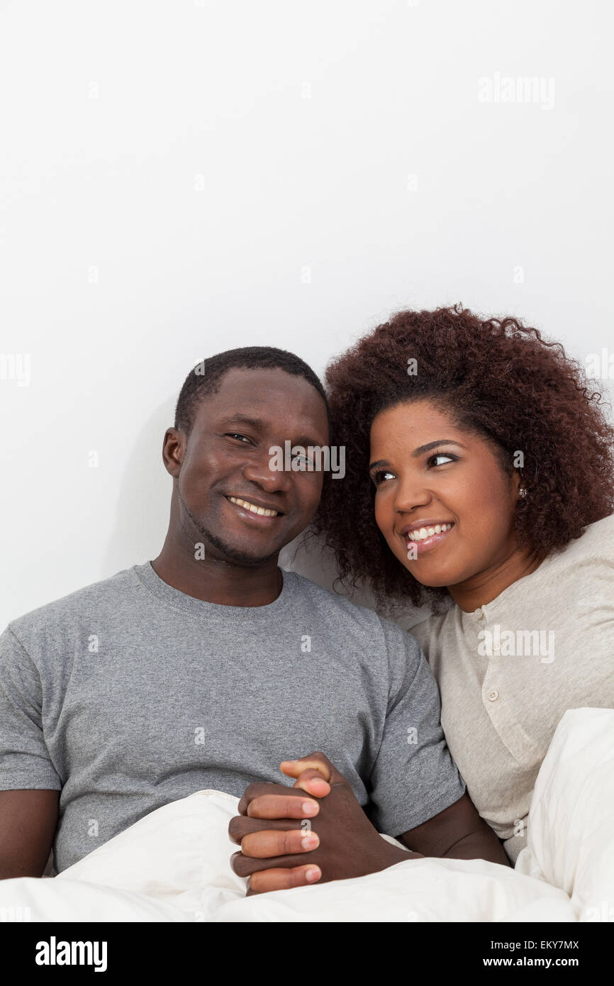 African couple in love on the bed Stock Photo - Alamy