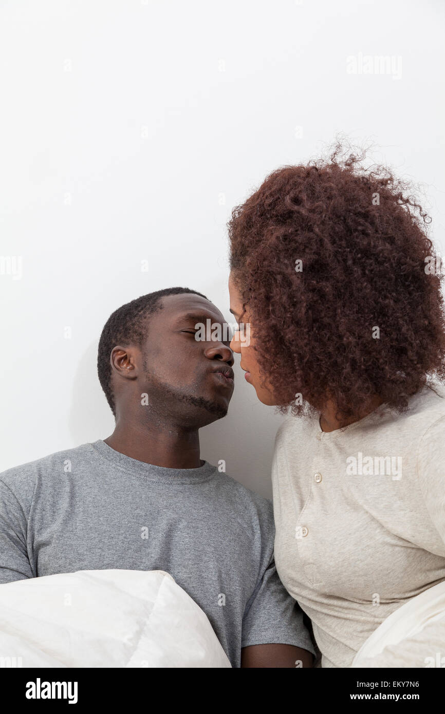African couple in love on the bed Stock Photo - Alamy
