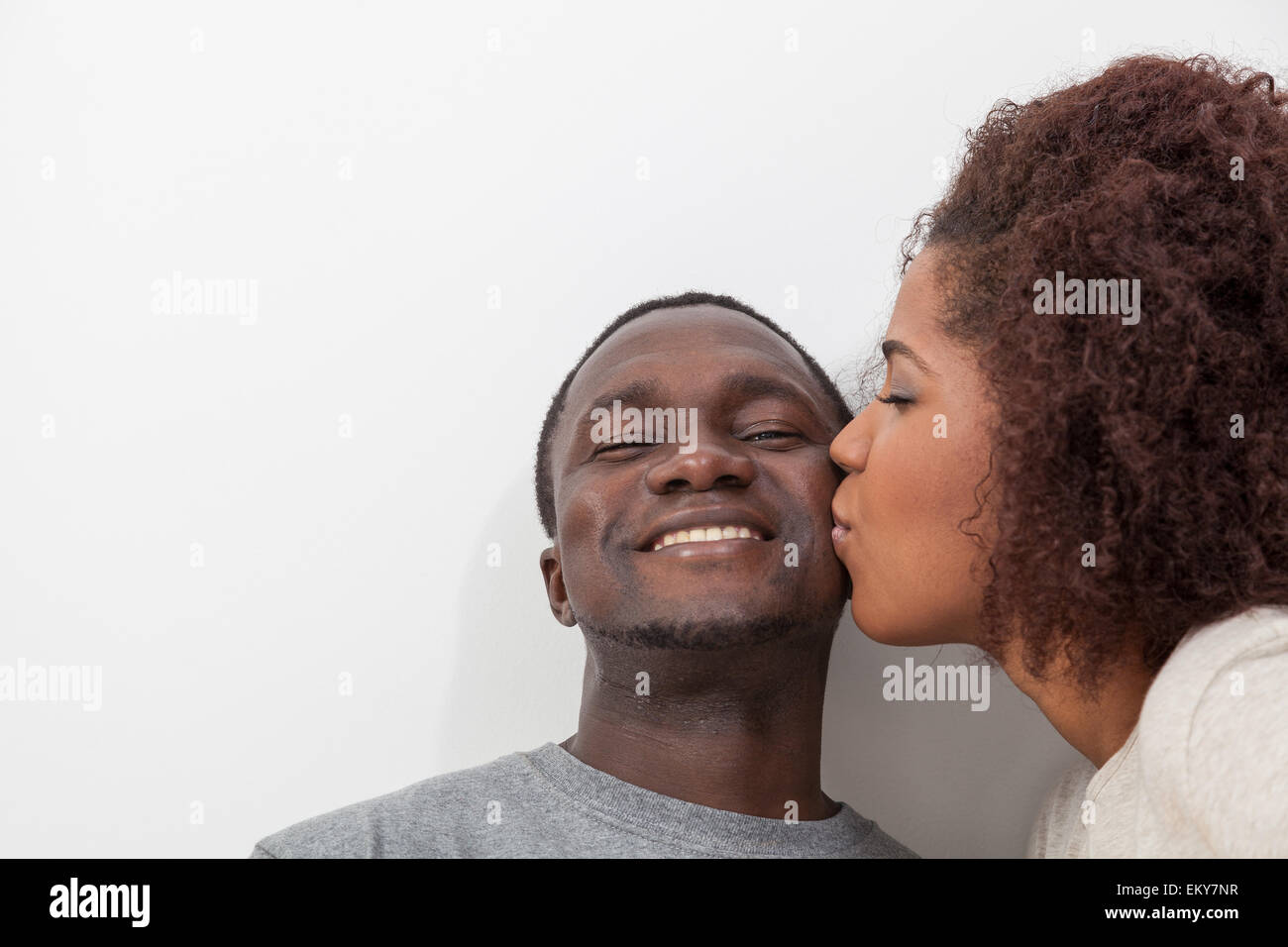African couple in love on the bed Stock Photo - Alamy
