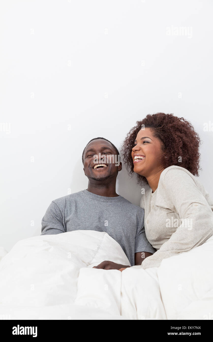 African couple in love on the bed Stock Photo - Alamy