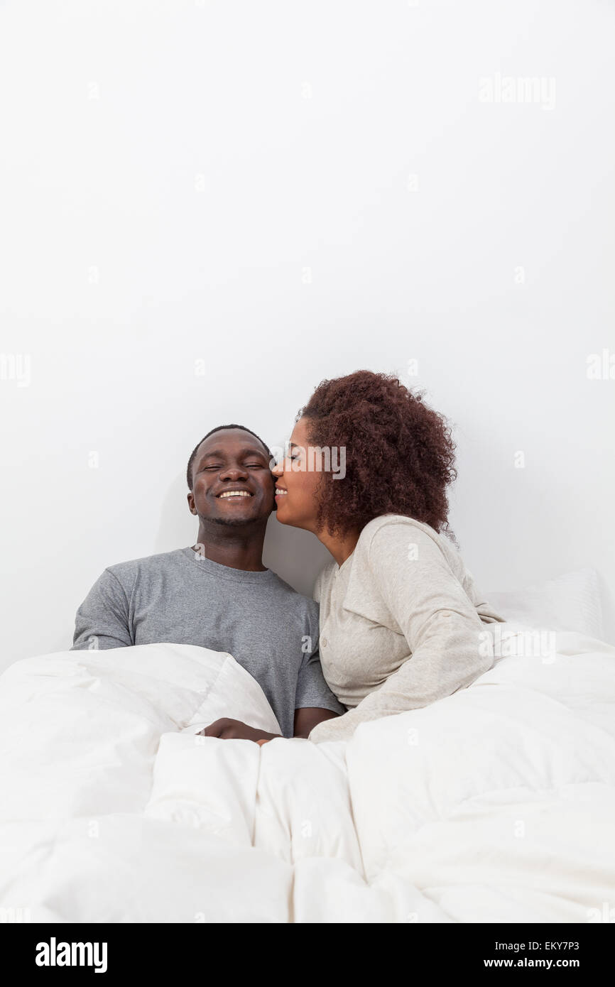 African couple in love on the bed Stock Photo - Alamy