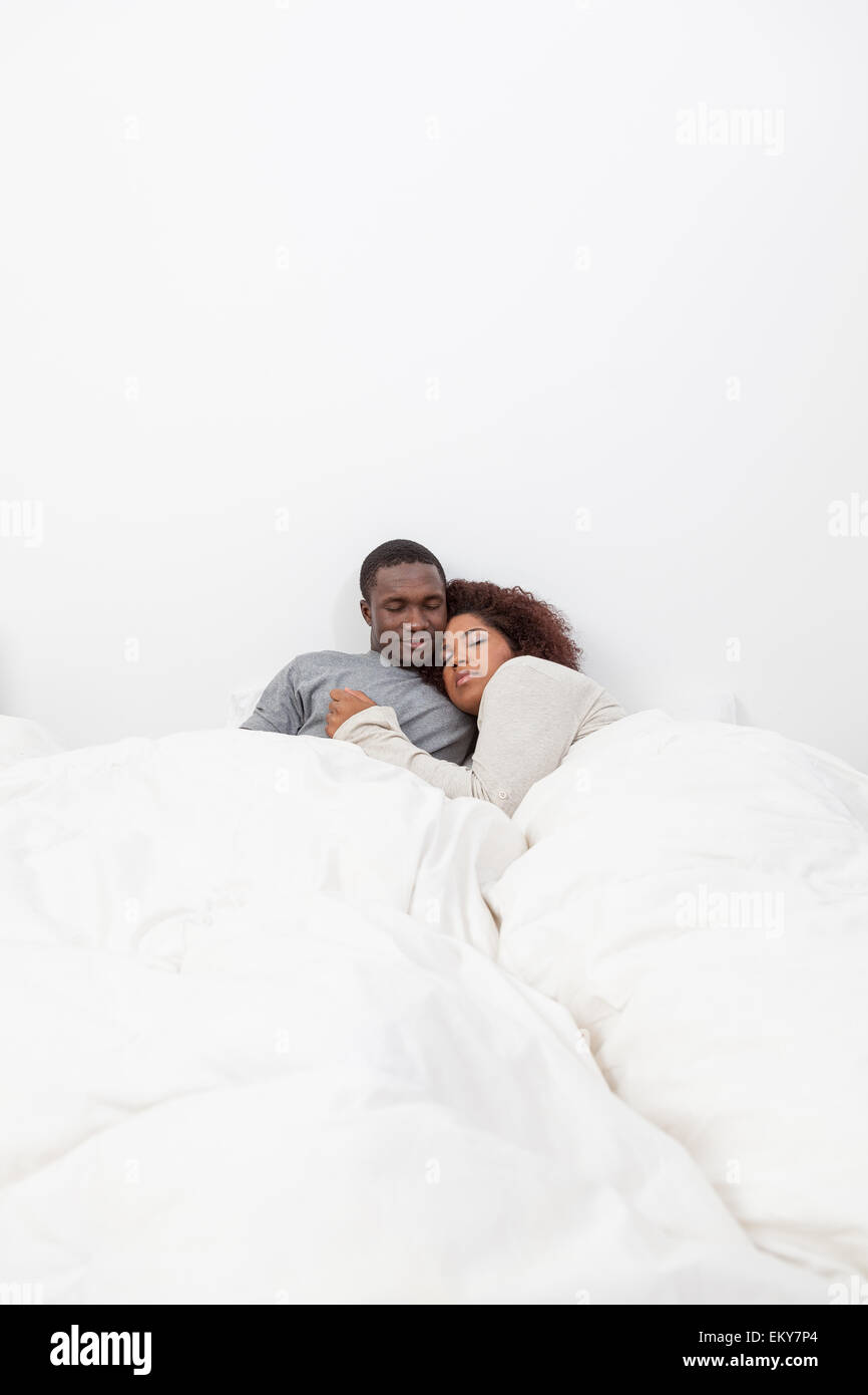 African couple in love on the bed Stock Photo - Alamy