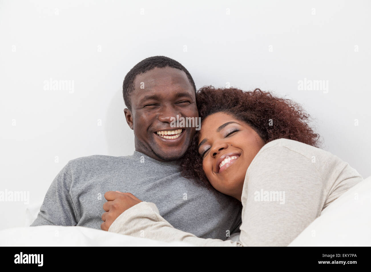 African couple in love on the bed Stock Photo Alamy